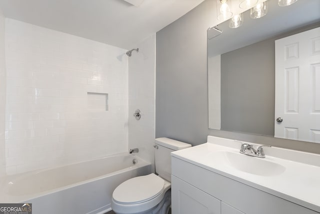 full bath with tub / shower combination, vanity, and toilet