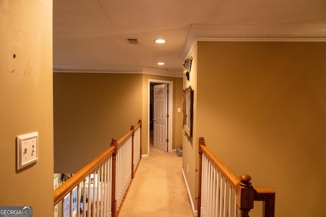 hallway featuring recessed lighting, light colored carpet, visible vents, an upstairs landing, and crown molding