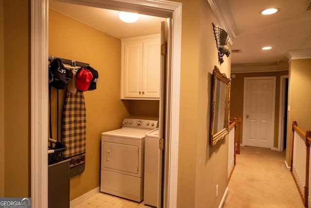 laundry area with cabinet space, baseboards, ornamental molding, separate washer and dryer, and recessed lighting