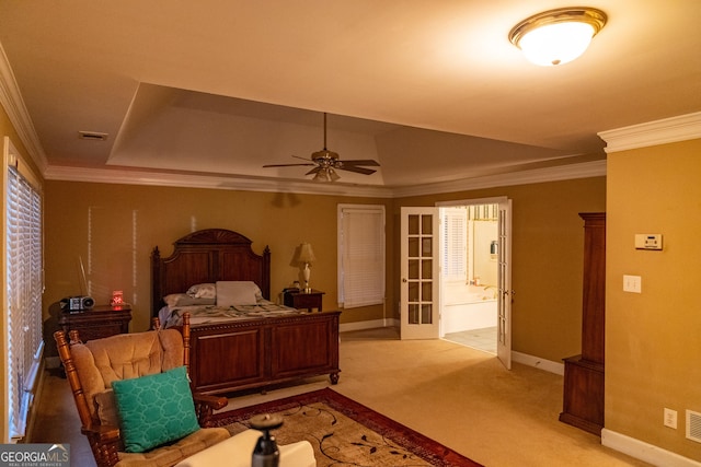 bedroom with light carpet, french doors, baseboards, and crown molding