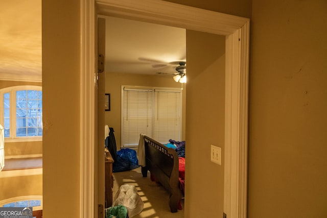 interior space featuring a ceiling fan