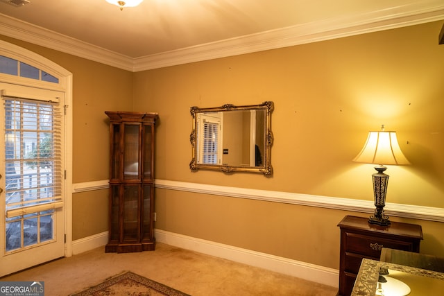 interior space with baseboards, visible vents, and ornamental molding