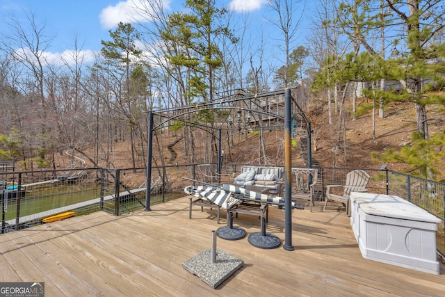 wooden terrace featuring an outdoor living space