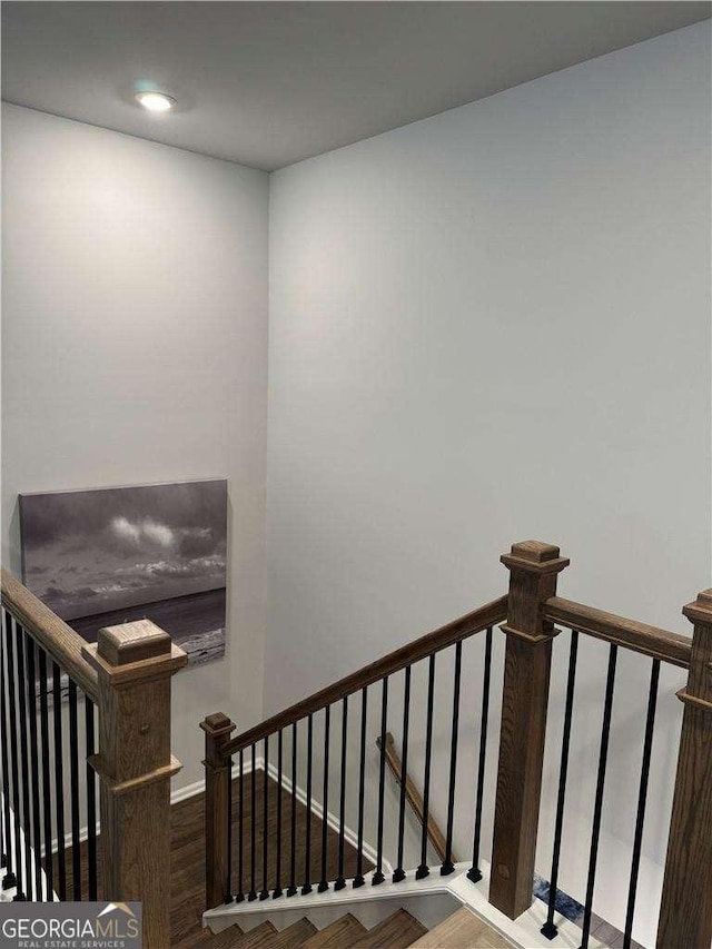 stairs featuring baseboards