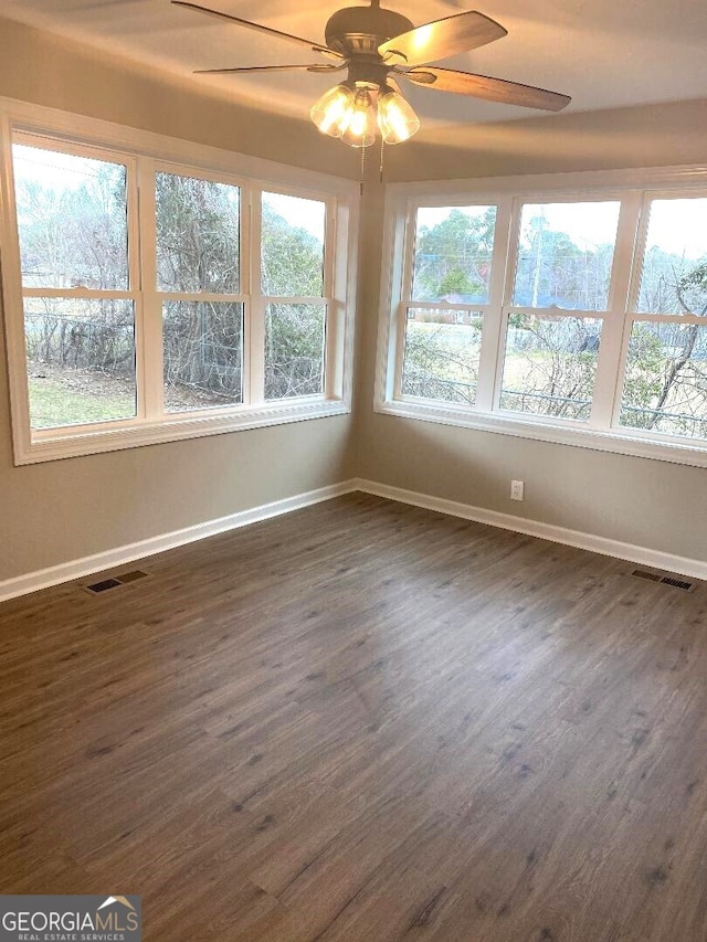 646 Enterprise St, Swainsboro, GA 30401 - unfurnished sunroom featuring ceiling fan and visible vents