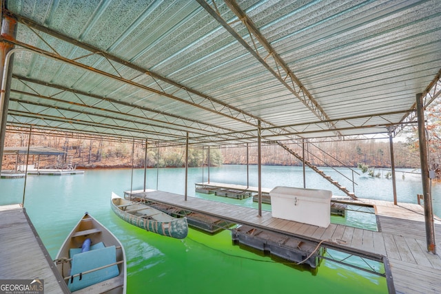 dock area featuring a water view