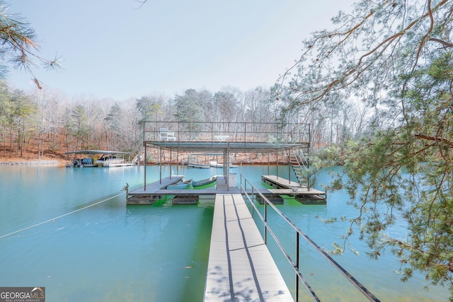 dock area featuring a water view