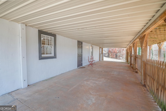 view of patio with an attached carport