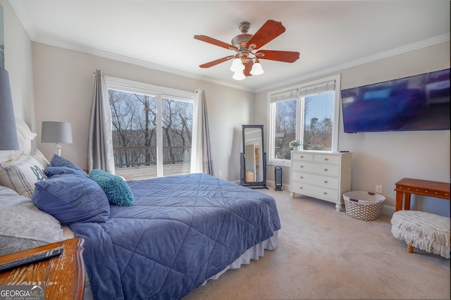 bedroom with multiple windows and crown molding