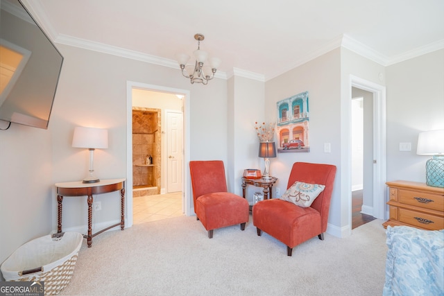 sitting room featuring carpet floors, a notable chandelier, ornamental molding, and baseboards