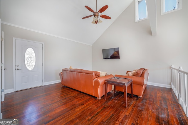 living area with high vaulted ceiling, ceiling fan, baseboards, and wood finished floors