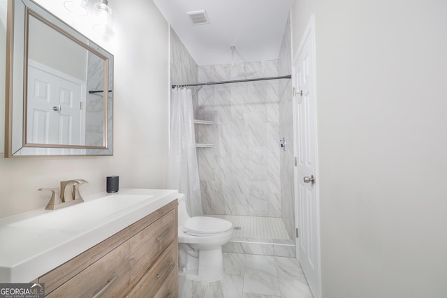 full bathroom featuring marble finish floor, visible vents, toilet, a stall shower, and vanity