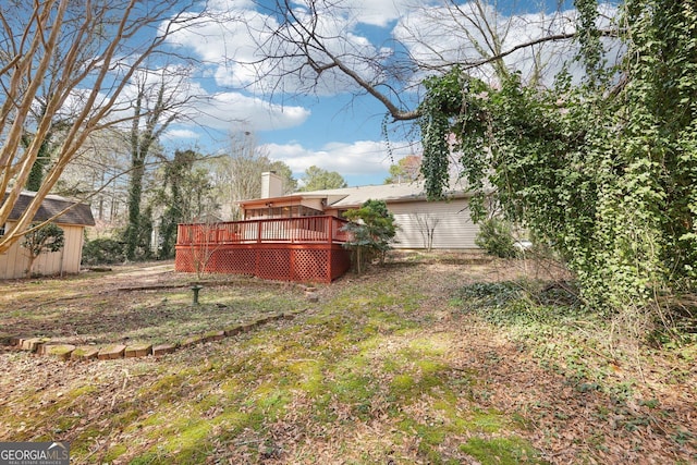 view of yard with a deck