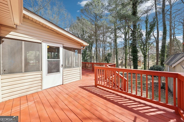 deck with a sunroom