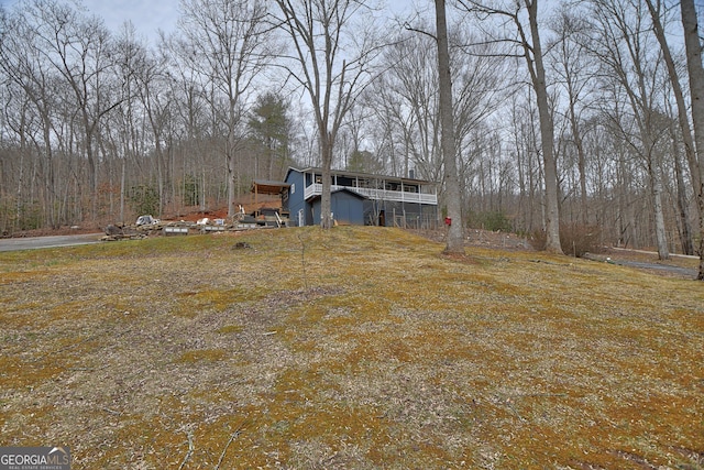 exterior space with a forest view