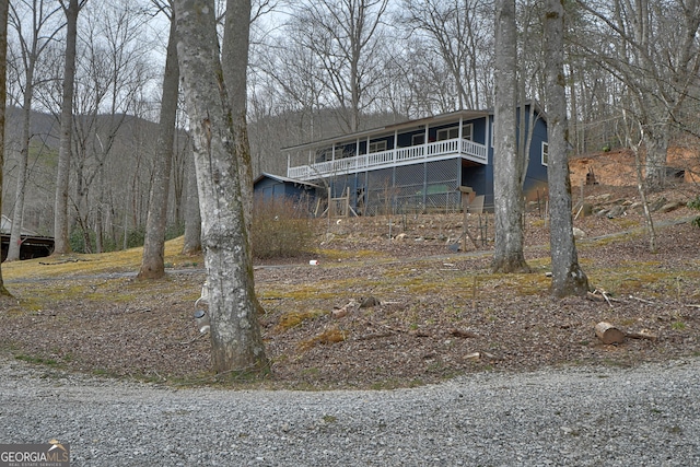 view of front of property with a deck