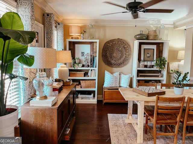 living area with dark wood-style floors, ceiling fan, and ornamental molding