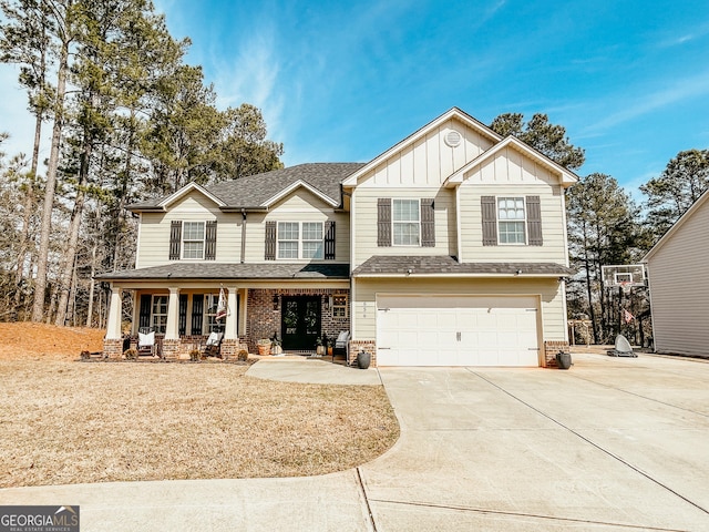 view of front of property with a porch, an attached garage, brick siding, driveway, and board and batten siding