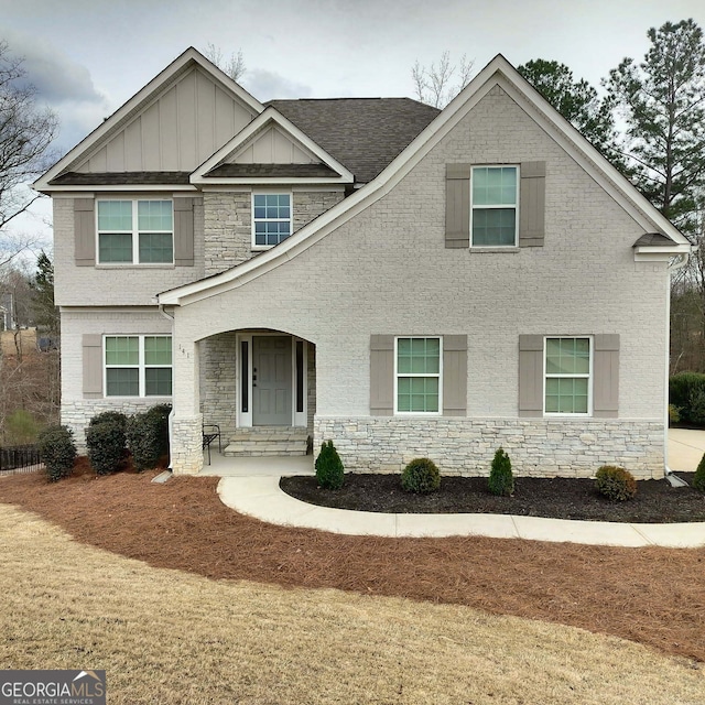 craftsman inspired home featuring board and batten siding