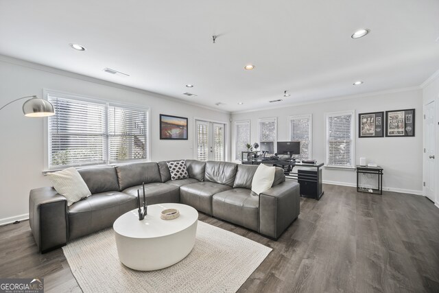 living room featuring visible vents, crown molding, baseboards, recessed lighting, and dark wood-style floors