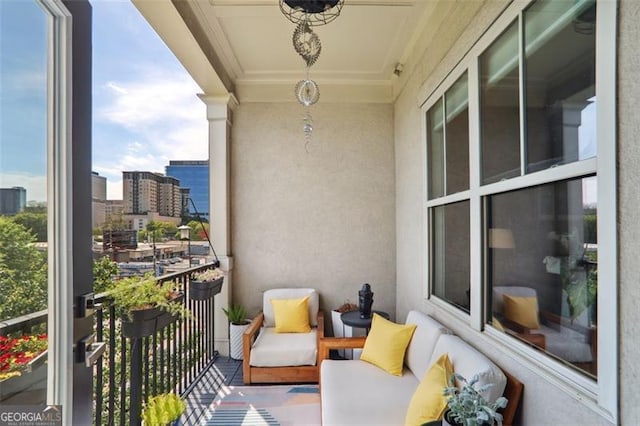 balcony featuring a city view