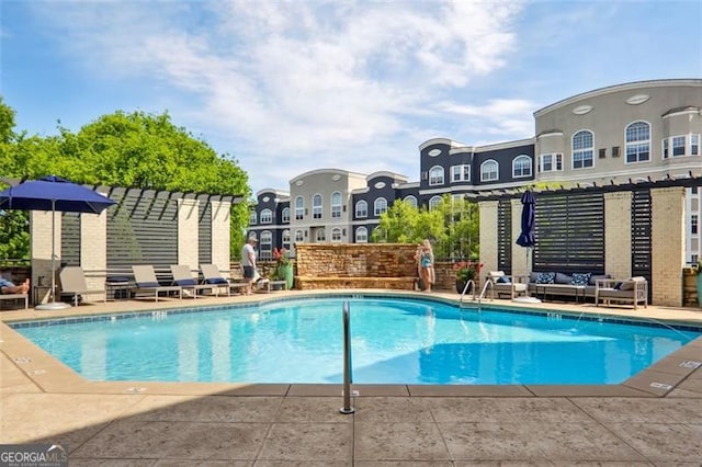 pool with a patio