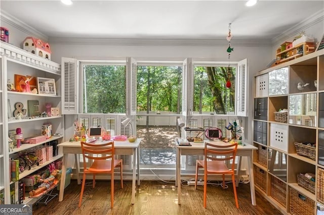 sunroom / solarium featuring a healthy amount of sunlight