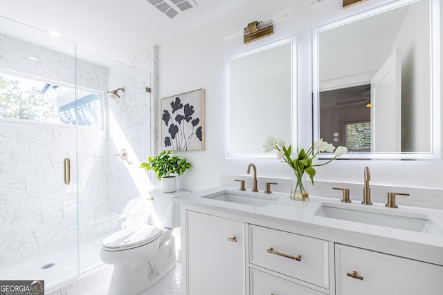 full bath featuring a wealth of natural light, visible vents, and a sink