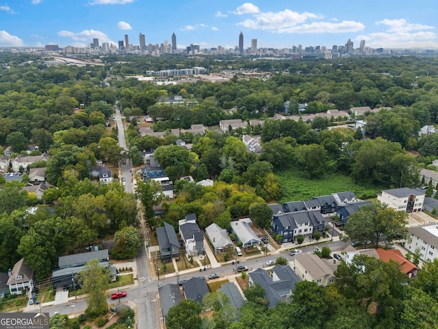 birds eye view of property with a city view