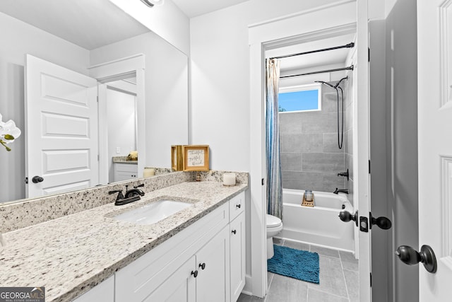 bathroom featuring shower / bath combination with curtain, tile patterned flooring, vanity, and toilet