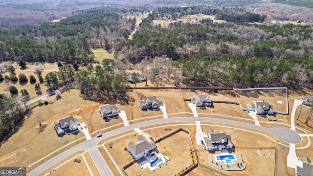 drone / aerial view with a forest view