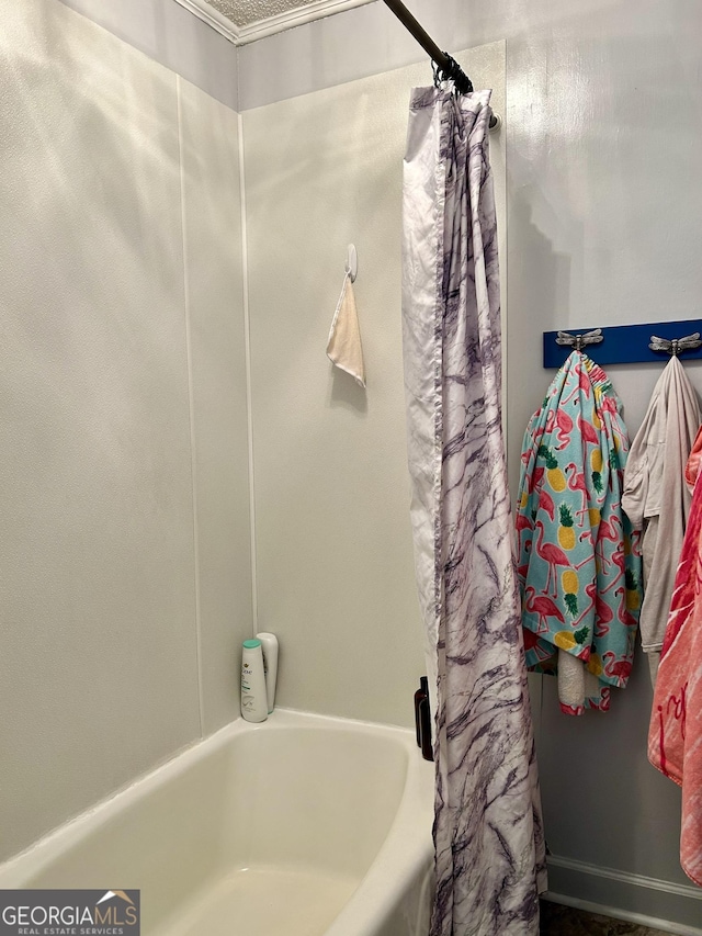 bathroom with shower / bathtub combination with curtain