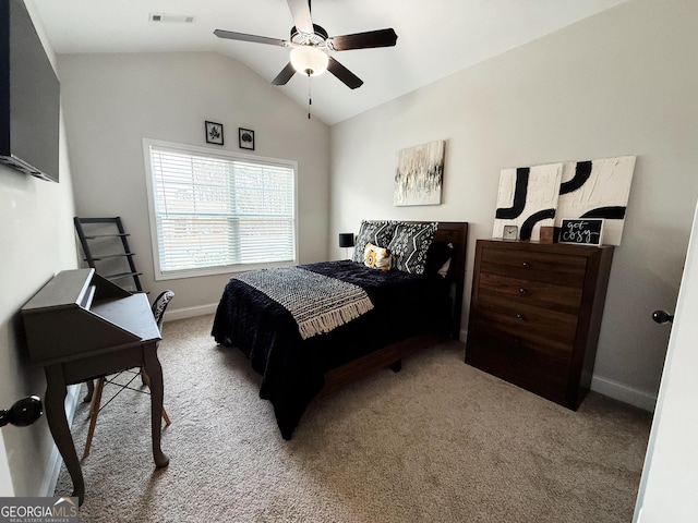 bedroom featuring lofted ceiling, ceiling fan, carpet flooring, visible vents, and baseboards