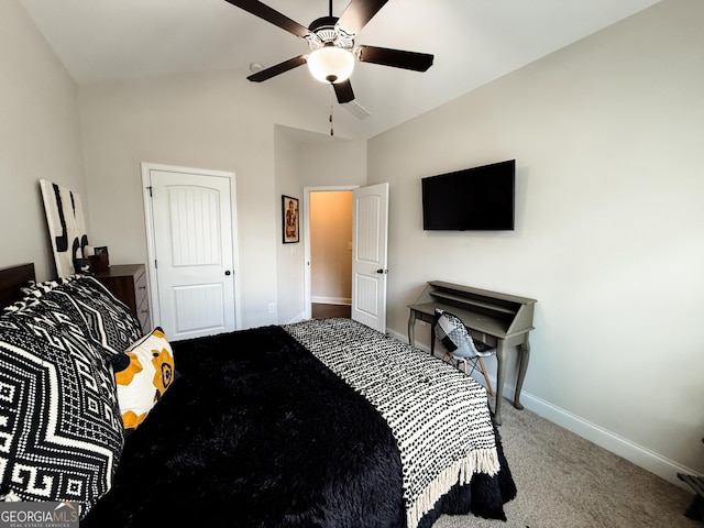 bedroom featuring lofted ceiling, a closet, a ceiling fan, carpet flooring, and baseboards