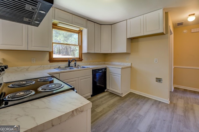 kitchen with range hood, visible vents, white cabinetry, a sink, and black appliances