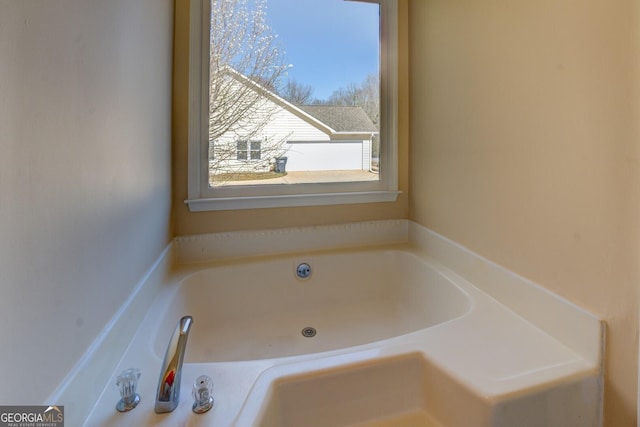 full bathroom featuring a garden tub