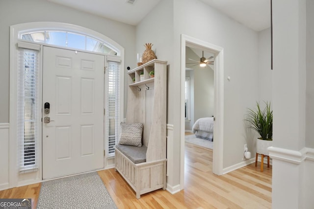 entryway featuring light wood-style floors, visible vents, and baseboards