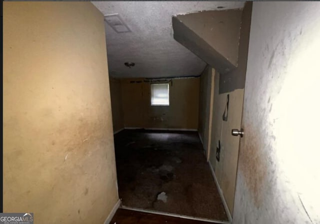 1188 Sunnydale Dr, Macon, GA 31217 - hallway with a textured ceiling
