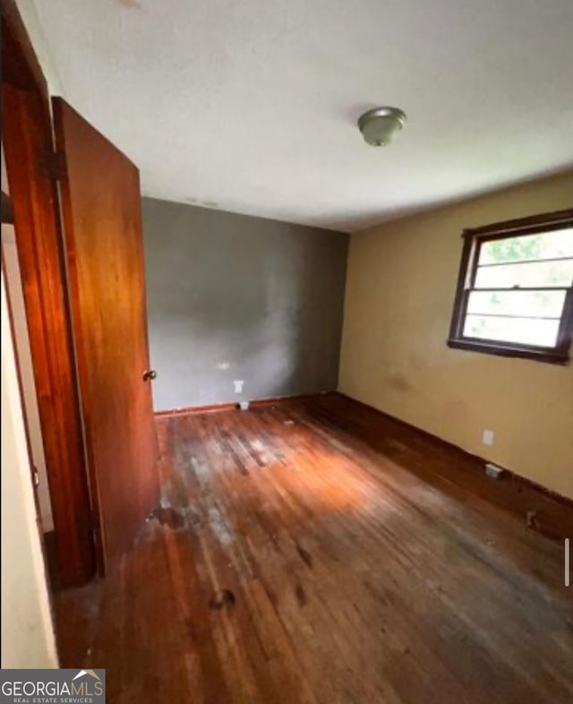 1188 Sunnydale Dr, Macon, GA 31217 - spare room with hardwood / wood-style floors