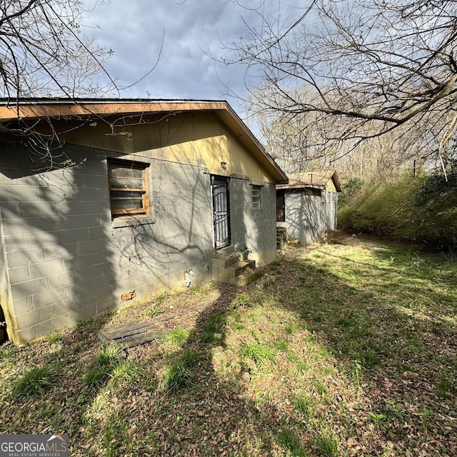 1188 Sunnydale Dr, Macon, GA 31217 - view of home's exterior featuring concrete block siding