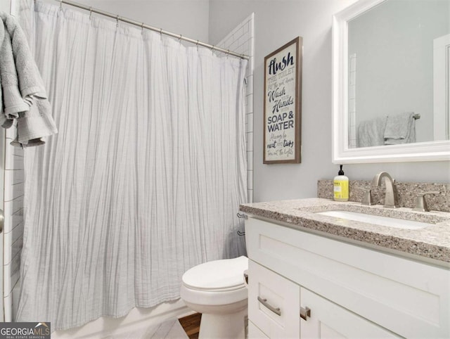 full bathroom with toilet, shower / bath combo, and vanity