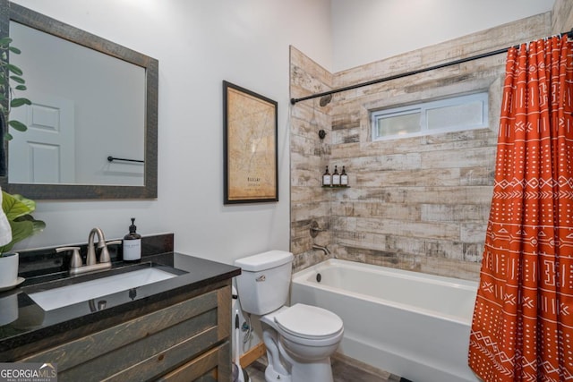 bathroom with vanity, toilet, and shower / tub combo with curtain