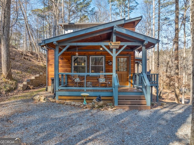 exterior space featuring covered porch