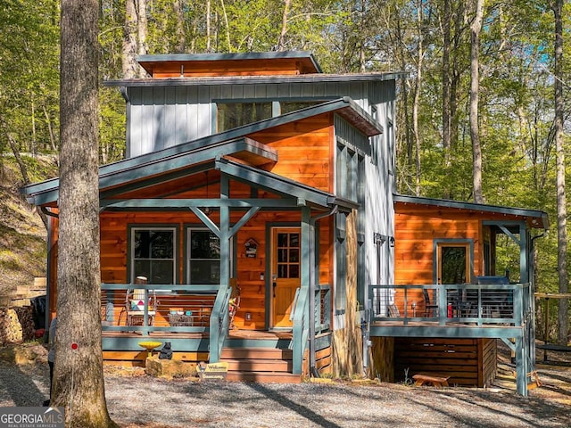 modern home with covered porch