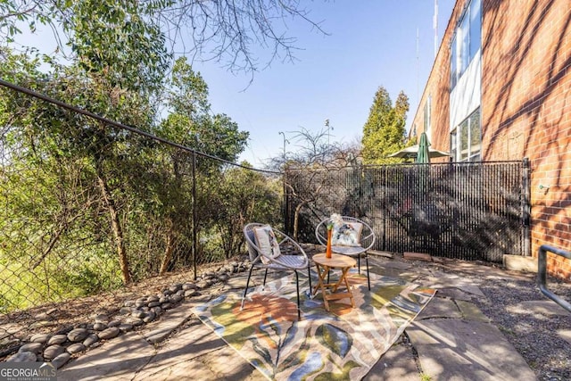 view of patio / terrace with fence