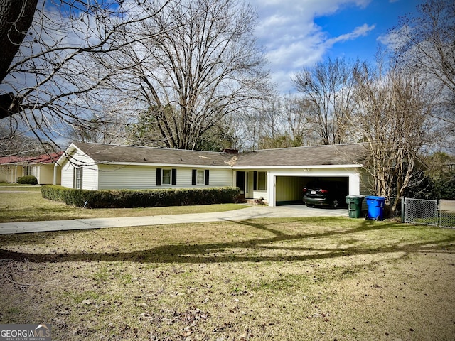 ranch-style house featuring a garage, fence, a front lawn, and concrete driveway