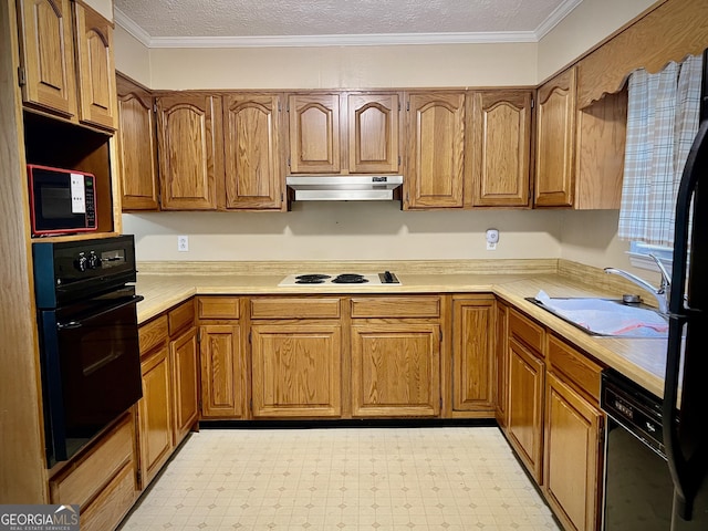 kitchen with light floors, light countertops, under cabinet range hood, and black appliances