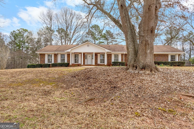 view of front of property with brick siding