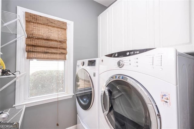 laundry area featuring laundry area and independent washer and dryer