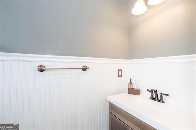 bathroom with wainscoting and vanity